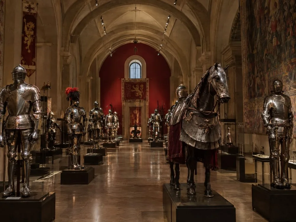 Full harnesses and armour ranked in a hall of the Army Museum
